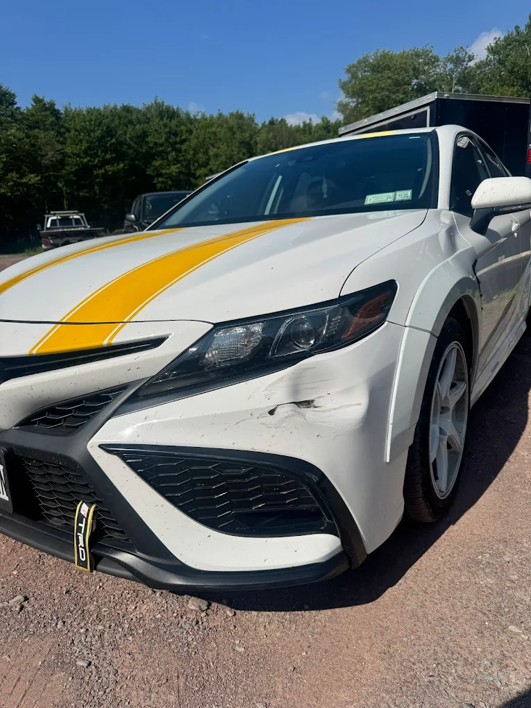 High-Level Auto Body shop team at work